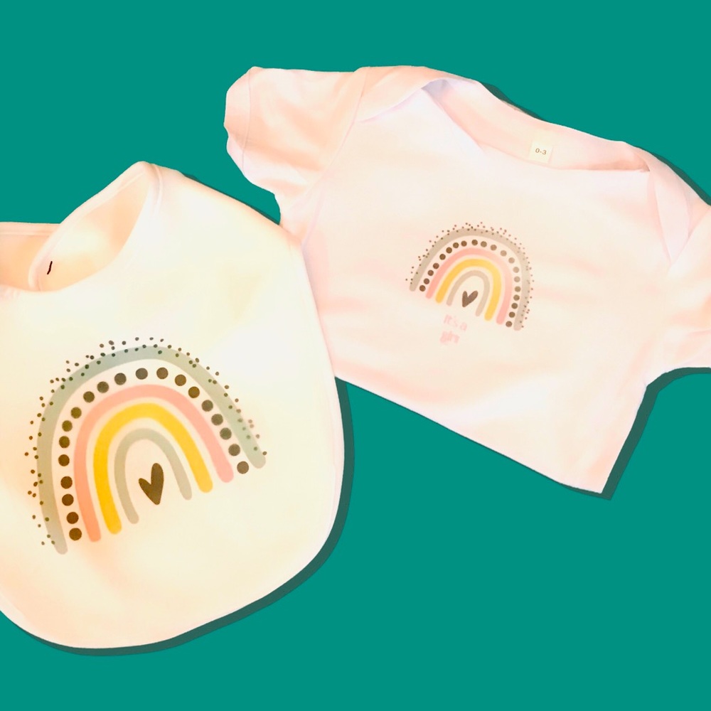 It is a girl Newborn 0-3 onesies and rainbow bib